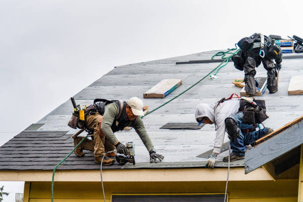 Professional Gutter Installation technician working in Lionville, PA